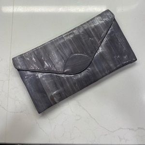 Grey eel skin clutch